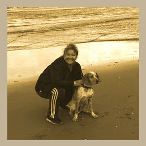 Ellen op het strand met haar eigen hond